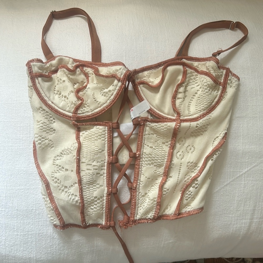 White and brown corset going out too